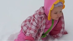 The baby play with snow scene video highlights for the first time