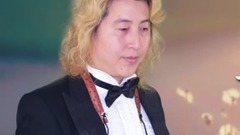 再回首典